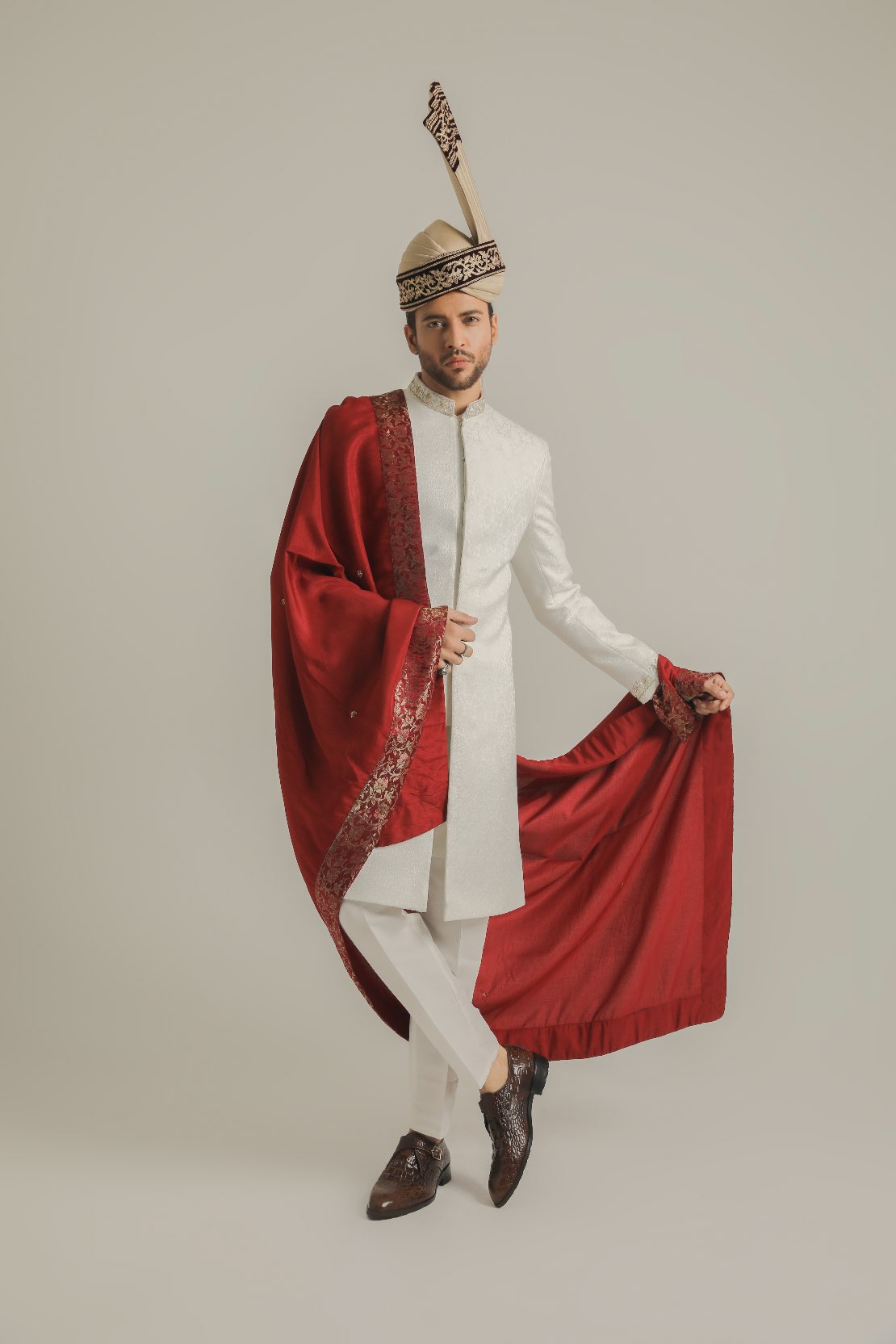 Sovereign White Attire with Red Accents